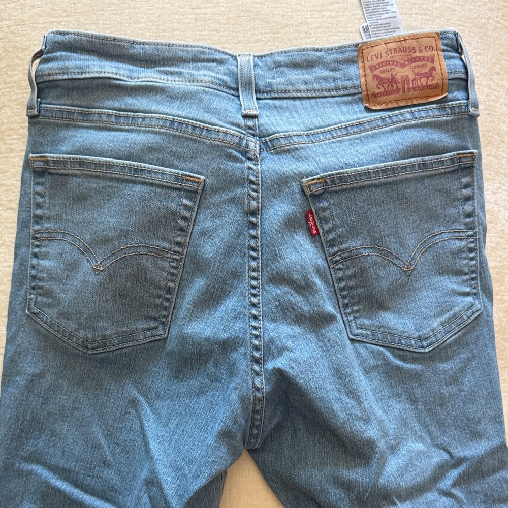 Levi's women’s Light Wash frayed flare jeans